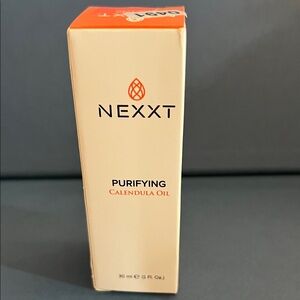 Nexx Calendula Oil in Cream and Orange Packaging